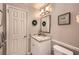 Cozy bathroom featuring a granite vanity top and a decorative wreath at 2917 Townley Cir, Atlanta, GA 30340