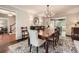 Spacious dining room with hardwood floors and an open view of the living room at 2917 Townley Cir, Atlanta, GA 30340