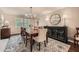 Elegant dining room with modern chandelier, decorative rug, and stylish sideboard at 2917 Townley Cir, Atlanta, GA 30340