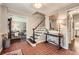 Welcoming foyer with red brick floors, a staircase, and neutral paint colors at 2917 Townley Cir, Atlanta, GA 30340
