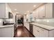 Modern kitchen with white cabinets, granite countertops, and stainless steel appliances at 2917 Townley Cir, Atlanta, GA 30340