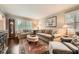 Cozy living room with hardwood floors, shuttered windows, and a neutral color palette at 2917 Townley Cir, Atlanta, GA 30340