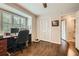 Office space with hardwood floors, closet, window with plantation shutters at 2917 Townley Cir, Atlanta, GA 30340