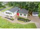 Aerial view of home with a large lot, well-maintained landscaping, and a storage shed at 3751 Cherokee Se Pl, Marietta, GA 30067