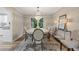 Elegant dining room with chandelier, neutral colors, and ample space for entertaining at 3751 Cherokee Se Pl, Marietta, GA 30067