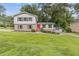 Charming two-story home featuring a bright red front door and well-maintained landscaping at 3751 Cherokee Se Pl, Marietta, GA 30067