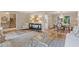 Open-concept living area leading to dining room and foyer, complete with stylish furniture at 3751 Cherokee Se Pl, Marietta, GA 30067