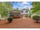 Charming home with a screened in porch and mature trees in the backyard at 3751 Cherokee Se Pl, Marietta, GA 30067