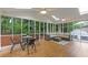 Bright sunroom with multiple skylights, a ceiling fan, and a view of the outdoors at 3751 Cherokee Se Pl, Marietta, GA 30067