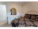 Bedroom featuring a comfortable bed, dresser and mirror at 40 Oak Hill Dr, Covington, GA 30016