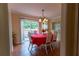 Dining room with tile floor, bright light from sliding glass door, table with seating at 40 Oak Hill Dr, Covington, GA 30016