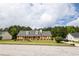 Well-maintained single-Gathering home with brick facade,dormer windows and lovely landscaped yard at 40 Oak Hill Dr, Covington, GA 30016