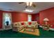 Spacious living room features plush sectional seating and a cozy ambiance at 40 Oak Hill Dr, Covington, GA 30016