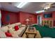 Comfortable living room featuring plush seating, TV, and classic decor at 40 Oak Hill Dr, Covington, GA 30016