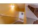 Staircase with carpeted steps and a wooden handrail at 40 Oak Hill Dr, Covington, GA 30016