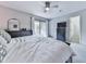 Spacious bedroom with a neutral color palette and access to a balcony at 708 Hanover Se Ln, Marietta, GA 30067