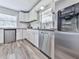 Modern kitchen featuring stainless steel appliances, white cabinets, and granite countertops at 708 Hanover Se Ln, Marietta, GA 30067