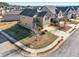 Beautiful two-story home featuring manicured landscaping, a covered front porch, and an attached two-car garage at 2528 Shropshire Pl, Mcdonough, GA 30253