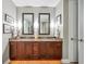 Modern bathroom with dual sinks, granite countertops, and stylish fixtures, designed for convenience and elegance at 270 17Th Nw St # 3606, Atlanta, GA 30363