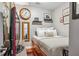 Cozy bedroom featuring unique bed with storage drawers, contemporary decor, and a wall-mounted TV at 270 17Th Nw St # 3606, Atlanta, GA 30363