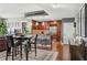 A living room area showcasing the gourmet kitchen, dining room, and a mix of modern and classic decor at 270 17Th Nw St # 3606, Atlanta, GA 30363