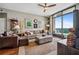 A stylish living room with comfortable seating, modern decor, and floor to ceiling windows at 270 17Th Nw St # 3606, Atlanta, GA 30363