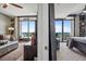 A living room and bedroom can be seen in an open concept layout with a view of the outside at 270 17Th Nw St # 3606, Atlanta, GA 30363
