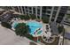 Aerial view of the pool with sun loungers, well-maintained landscaping, and relaxing amenities at 270 17Th Nw St # 3606, Atlanta, GA 30363