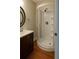 Bathroom with a new vanity, mirror, and standup shower at 421 Congress Pkwy, Lawrenceville, GA 30044