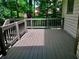 Private outdoor deck perfect for entertaining and relaxing with wooded views at 421 Congress Pkwy, Lawrenceville, GA 30044