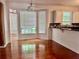 An open kitchen space opens up to a dining room with a bay window at 421 Congress Pkwy, Lawrenceville, GA 30044