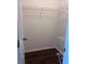 A small walk-in closet with wire shelving and dark flooring at 421 Congress Pkwy, Lawrenceville, GA 30044