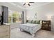 Comfortable bedroom with plush carpeting, natural light, and coordinated decor at 553 Onyx Lndg, Marietta, GA 30064