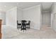 Spacious bonus room with carpet flooring, a table, and ample space for activities at 553 Onyx Lndg, Marietta, GA 30064