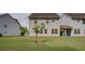 Exterior shot of the back of the house highlighting the lawn and siding at 6245 Hickory Lane Cir, Union City, GA 30291