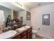 Spacious bathroom featuring a double vanity, ample counter space, and modern decor at 6245 Hickory Lane Cir, Union City, GA 30291