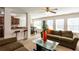 Comfortable living room with a large sofa, glass coffee table, and an open layout at 6245 Hickory Lane Cir, Union City, GA 30291