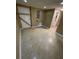 Large basement area with access to a door and partial bath at 6399 Boca Grande Blvd, Forest Park, GA 30297