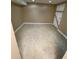 Basement area with vinyl flooring and access to a door at 6399 Boca Grande Blvd, Forest Park, GA 30297