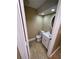 Cozy bathroom featuring a toilet, vanity and mirror at 6399 Boca Grande Blvd, Forest Park, GA 30297