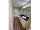 Bathroom features updated vanity and tub/shower combination at 6399 Boca Grande Blvd, Forest Park, GA 30297