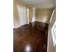 Bedroom with hardwood floors and a double door closet for plenty of storage at 6399 Boca Grande Blvd, Forest Park, GA 30297