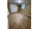 Neutral colored bedroom with tile floors and a window at 6399 Boca Grande Blvd, Forest Park, GA 30297