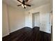 Spacious bedroom with hardwood floors, multiple closets, and neutral paint at 1101 Juniper Ne St # 1506, Atlanta, GA 30309