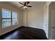 Bright bedroom with a ceiling fan, hardwood floors, and an amazing view of the city at 1101 Juniper Ne St # 1506, Atlanta, GA 30309