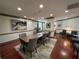 Community dining room with large painting and blue lounge area at 1101 Juniper Ne St # 1506, Atlanta, GA 30309