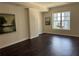 Spacious living room with hardwood floors and large windows offering lots of natural light at 1101 Juniper Ne St # 1506, Atlanta, GA 30309