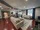 Spacious lobby area featuring hardwood floors, comfortable sofas, and a contemporary rug at 1101 Juniper Ne St # 1506, Atlanta, GA 30309