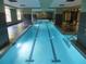 Indoor swimming pool with lane markers and tiled deck, perfect for year-round enjoyment at 1101 Juniper Ne St # 1506, Atlanta, GA 30309