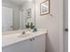 Clean bathroom with single vanity and mirror, offering a functional and stylish space at 4230 Glen Vista Ct, Duluth, GA 30097